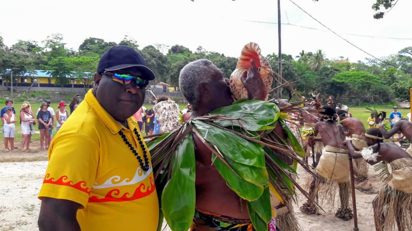 Frazer Mackie with a local cultural performer during a Port Vila tour